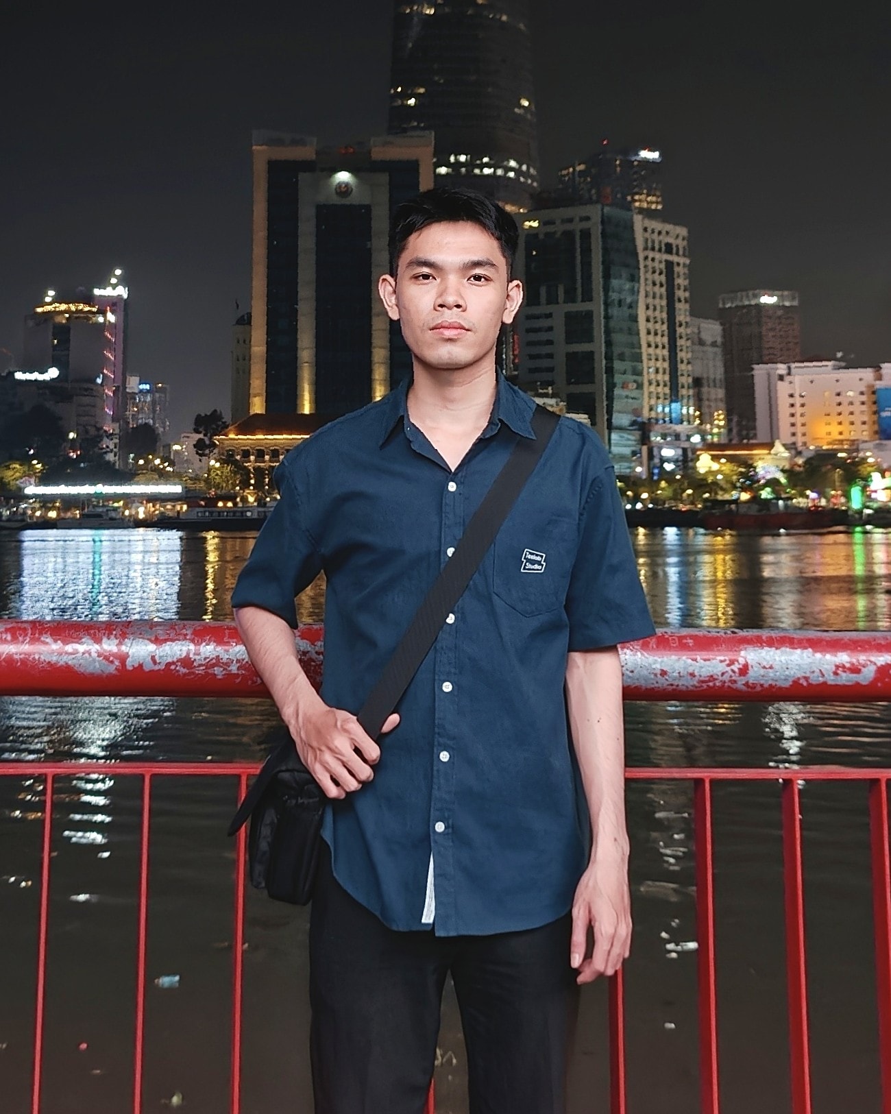 Vo Thong Khoa by the Saigon River at night